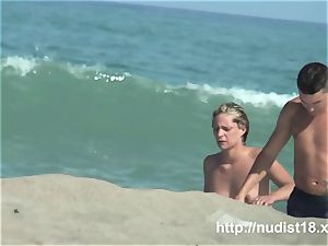 nude beach voyeur shoots a steamy honey with a hidden web cam